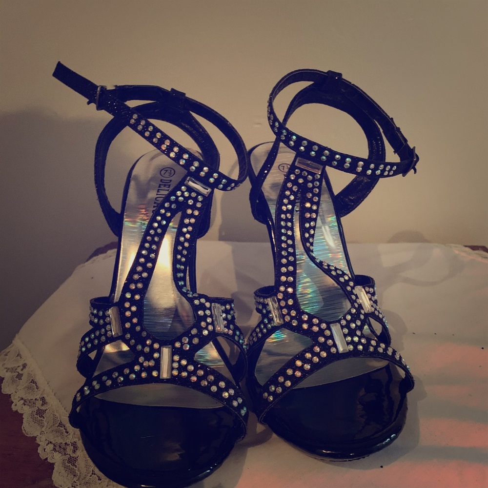 Black sandals with rhinestones on the straps